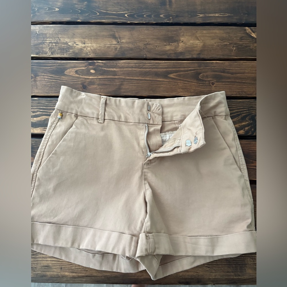 Tan Bermuda Shorts with Flat Front Design. No tags but never worn.